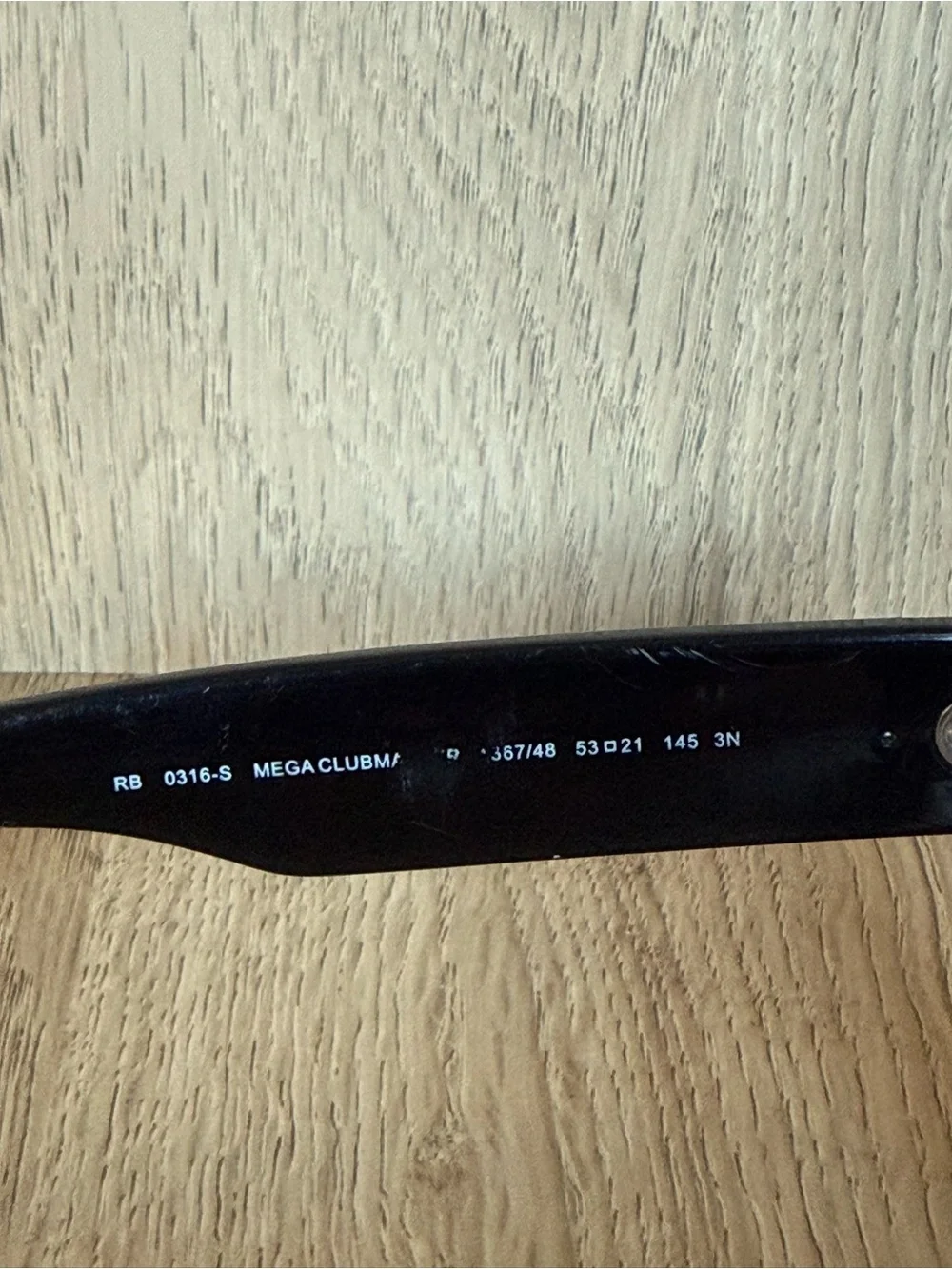 Ray-Ban Black Frame Sunglasses with Dark Lenses